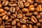 Fresh and aromatic roasted coffee beans, can be used as background