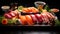 Fresh asian cuisine on a black plate - healthy dining with salmon sushi on a dark background