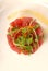 Fresh Asian seafood tartare with micro green salad