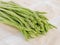 Fresh asparagus, on The fabric is placed on the table.