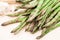 Fresh asparagus stems and garlic