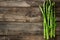 Fresh asparagus on wooden background