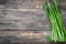 Fresh asparagus on wooden background