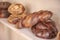 Fresh assortments of bread on the shelf in the bakery