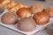 Fresh assortments of bread on the shelf in the bakery