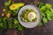 Fresh avocado breakfast with egg poached sandwich. Green salad a