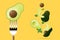 Fresh avocado on fork with flying avocados background , healthy food concept
