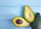 Fresh avocado tropical diet nutrition on a pink wooden lunch appetizer, pattern