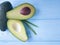 Fresh avocado tropical nutrition on a pink wooden lunch appetizer, pattern