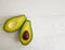 Fresh avocado on white wooden lunch