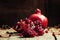 Fresh azerbaijan pomegranate, still life in rustic style, vintag