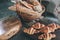 Fresh baguettes and croissant in a bakery standing in a wicker basket on the counter.