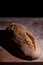 Fresh-baked bread on a wood cutting board