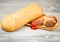 Fresh baked bun surrounds a meatball submarine sandwich