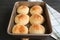 Fresh baked homemade Brazilian cheese bread or Pao de Queijo in the baking tray