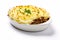 Fresh baked homemade cottage Shepherd's traditional pie served with greens on white background