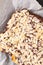 Fresh baked Homemade organic fudge brownies almond slice on black slate stone with copy space