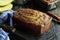 Fresh Banana Bread Cooling on Bakers Rack with Ingredients