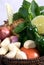 Fresh basket of herbs and vegetables