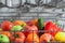 Fresh and beautiful vegetables and fruits are washed in the dishwasher, inside view, drops and splashes of water close-up