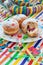 Fresh beignets on colorful plate