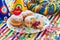 Fresh beignets on colorful plate