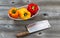 Fresh Bell Peppers in white bowl ready for cleaning