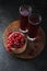 Fresh berries drink and bowl with red currant