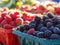 Fresh berries glistening with morning dew at a local farmer\\\'s market