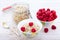Fresh berries raspberries, yogurt and homemade granola for breakfast, top view, horizontal