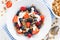 Fresh berries, yogurt and granola for breakfast