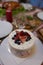 fresh berry cream cake elegantly presented at a festive gathering