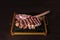 Fresh Bistecca alla Fiorentina on dark background