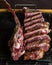 Fresh Bistecca alla Fiorentina on dark background