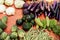 Fresh Bitter gourd, eggplant and vegetables in Asian morning market