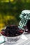 Fresh blackberries and a jar of jam