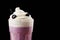 Fresh blackberry milkshake close-up