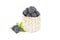 Fresh blackberry in wooden wicker basket, organic sweet black berry with leaf, healthy dessert food, closeup, isolated