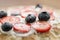 Fresh blinis or crepes with fresh berries and cream