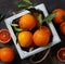 Fresh bloody oranges with leaves