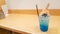 Fresh blue juice on table wood