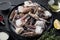 Fresh blue swimming crab Horse crab, Blue crab, Flower crab claws, on plate, on black wooden table background