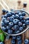 Fresh blueberries from organic cultivation on rustic wooden table
