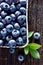 Fresh blueberries from organic cultivation on rustic wooden table