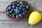 Fresh blueberries and ripe pear on wooden rustic table. Blueberry and pear.Healthy eating,diet and nutrition concept.