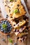 fresh blueberry loaf of bread muffin cake with mint closeup. vertical top view