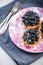 Fresh blueberry tart on vibrant plate