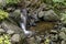 Fresh Boyana waterfalls in deep forest and rock