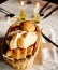 Fresh bread in basket. Slices roll breads in basket on table