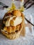 Fresh bread in basket. Slices roll breads in basket on table